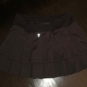 ivivva black tennis skirt!